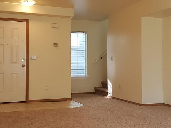 Main level living area with entertainment nook.
