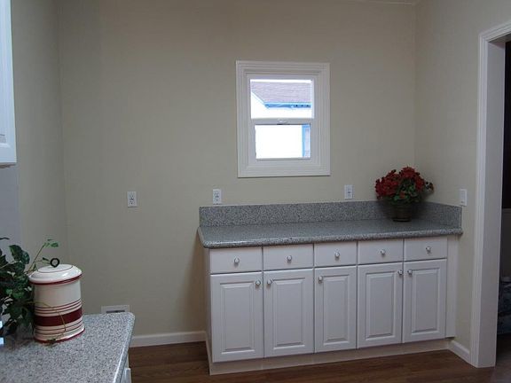 Lots of cabinets in kitchen