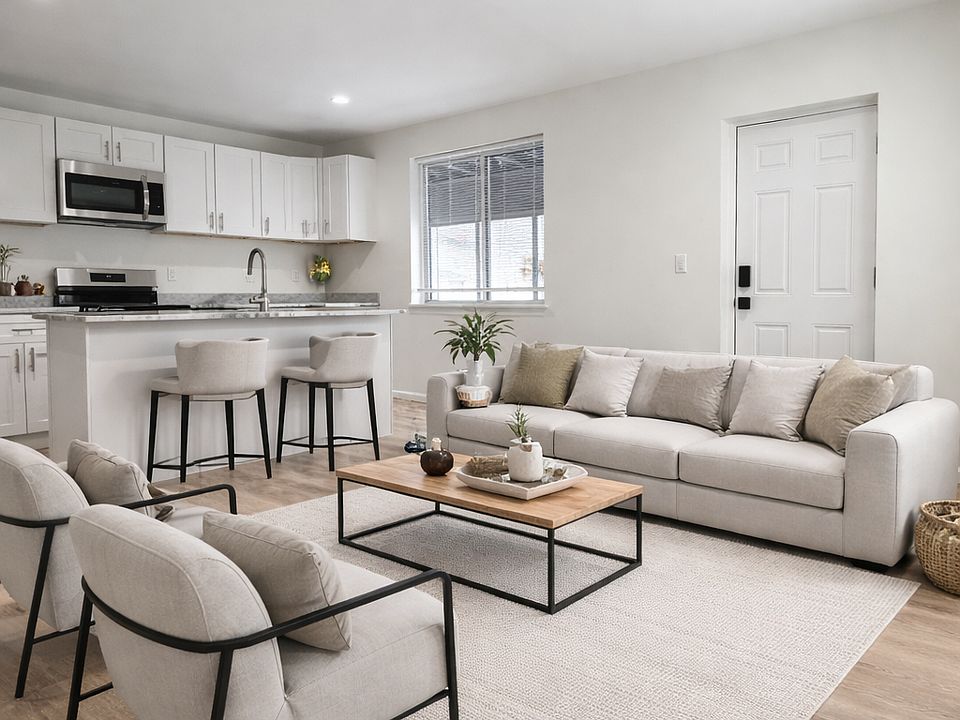 Living Room
Disclaimer:
Photo includes AI-generated furniture for staging purposes only. The unit is rented unfurnished.