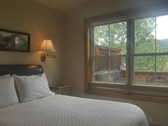 Master bedroom overlooking back deck and views to the east.