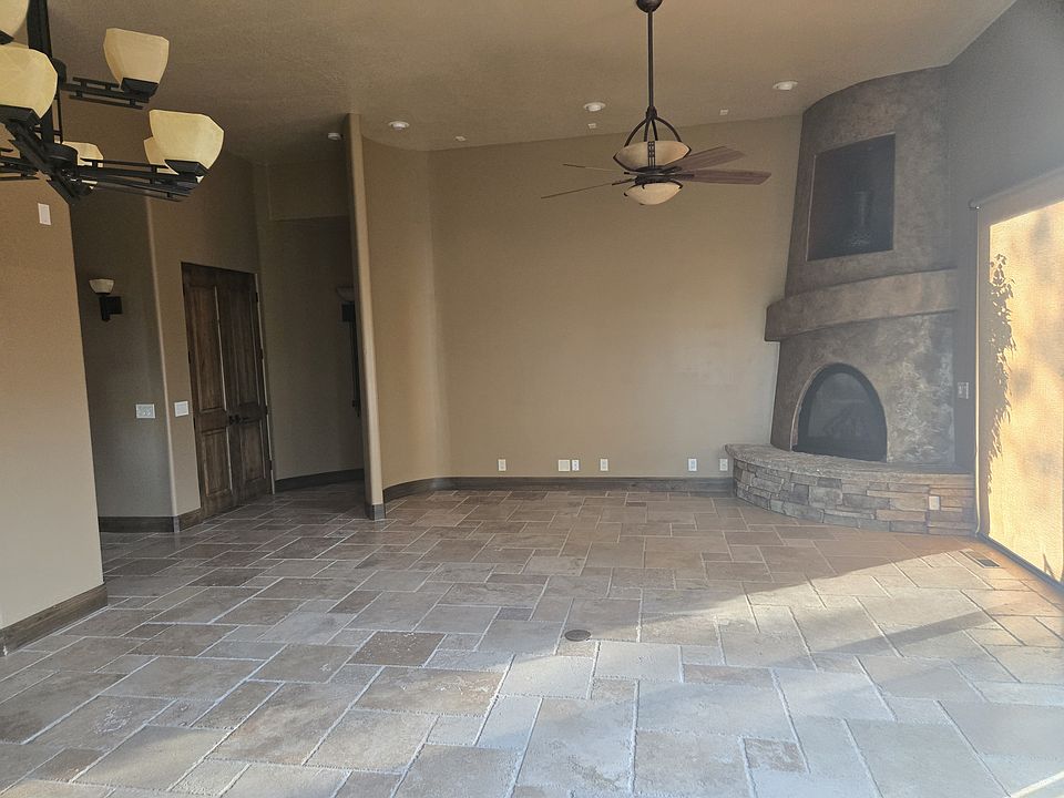 dining area looking out the side windows and kitchen