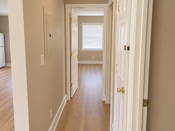 Hallway with storage closet