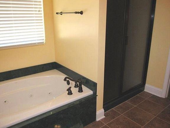 Master bath with jetted tub