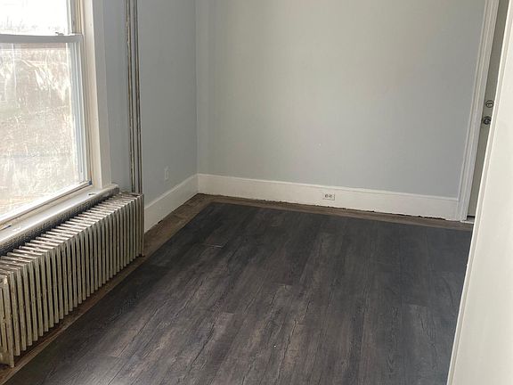 one of the 3 bedrooms