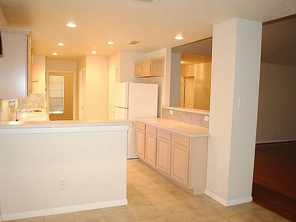A view of the kitchen from the breakfast room.