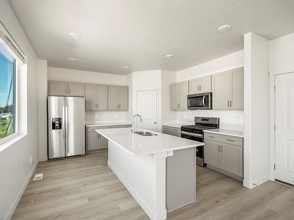 The residence 3 floorplan interior image taken at a Meritage Homes Community in West Haven, UT.