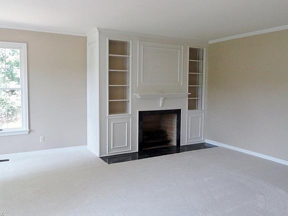 Formal L/room-new carpet/fireplace with built ins and marble