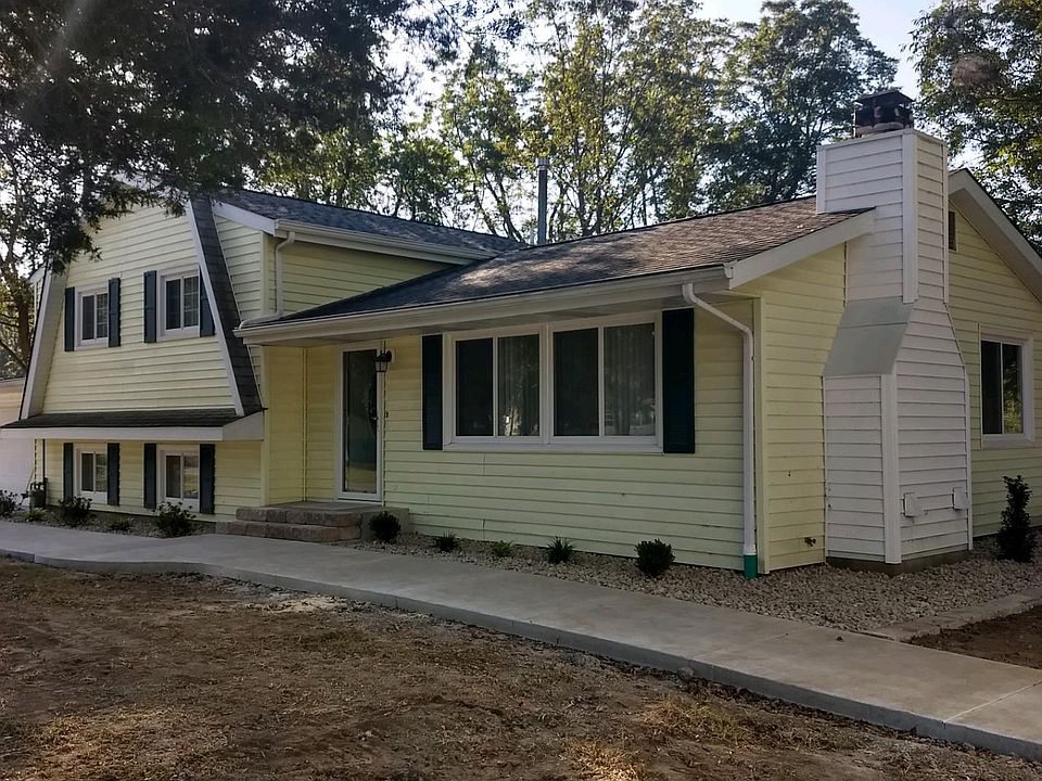 LANDSCAPED AND CONCRETE SIDEWALKS