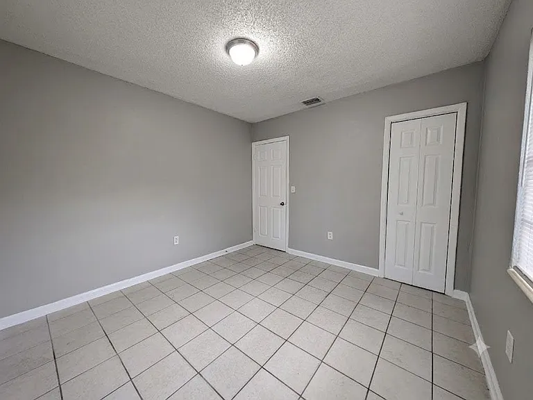 7704 N Taliaferro Ave — Photo 11