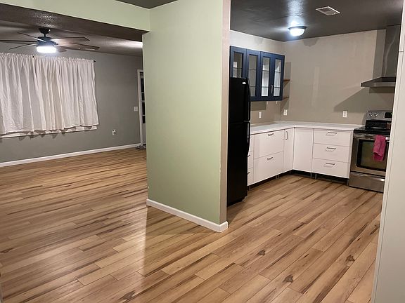 View from dining room of living room and kitchen