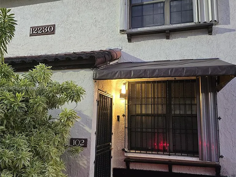 12230 SW 16th Ter #J-102 — Photo 1