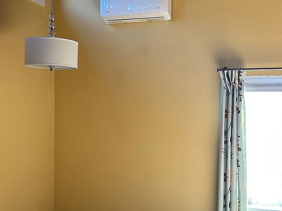 Cantilevered ceiling with mini splits AC/Heater