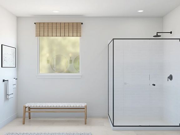 Primary bath with glass shower enclosure