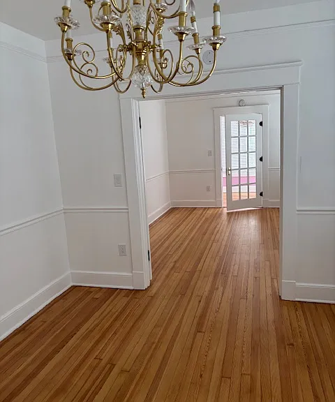 French Doors, brass chandelier