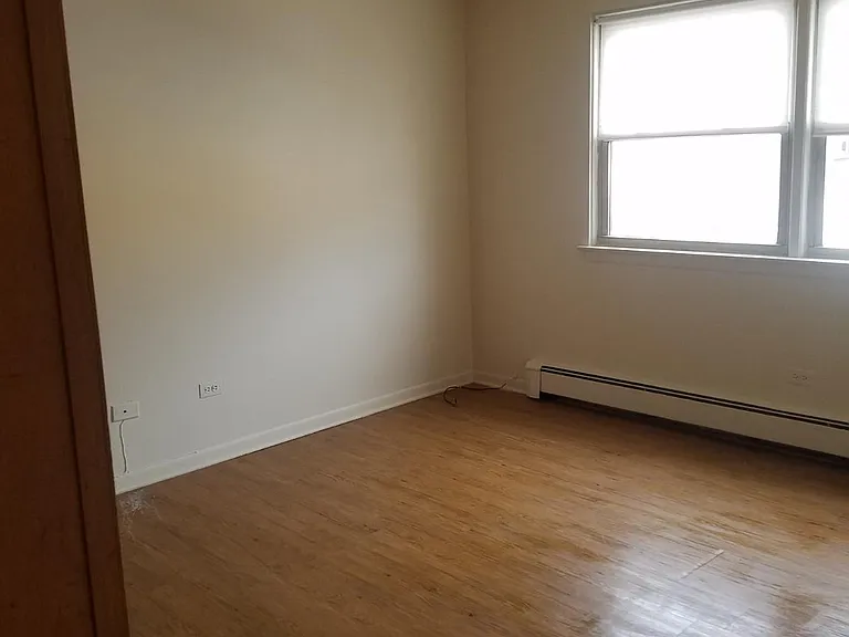 Living room with ceiling fan.