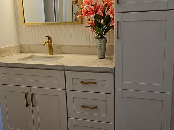 Vanity with quartz counter top
