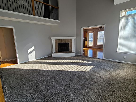 Living room with new carpet.