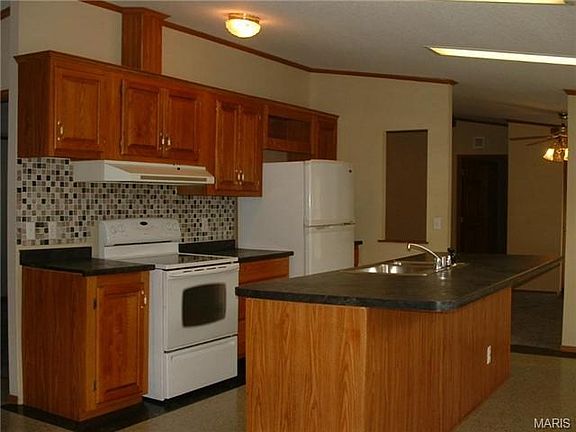 Wow! What a kitchen . . . refrigerator stays, smooth top electr