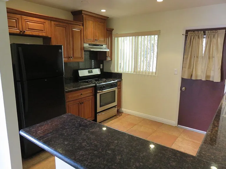 View of kitchen from living area.