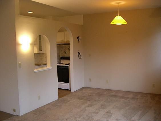 neat architectural detail b/w kitchen and dining area (old photo)