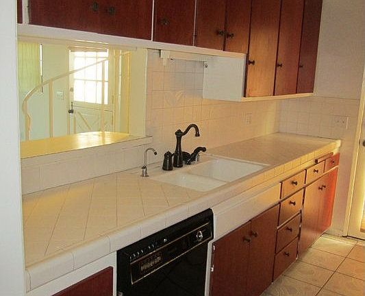 Sink And Dishwasher Facing The Living Room