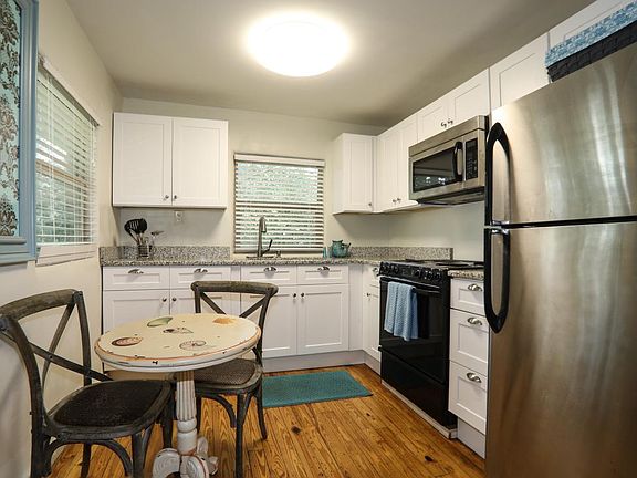 Kitchen with stainless appliances and granite countertops