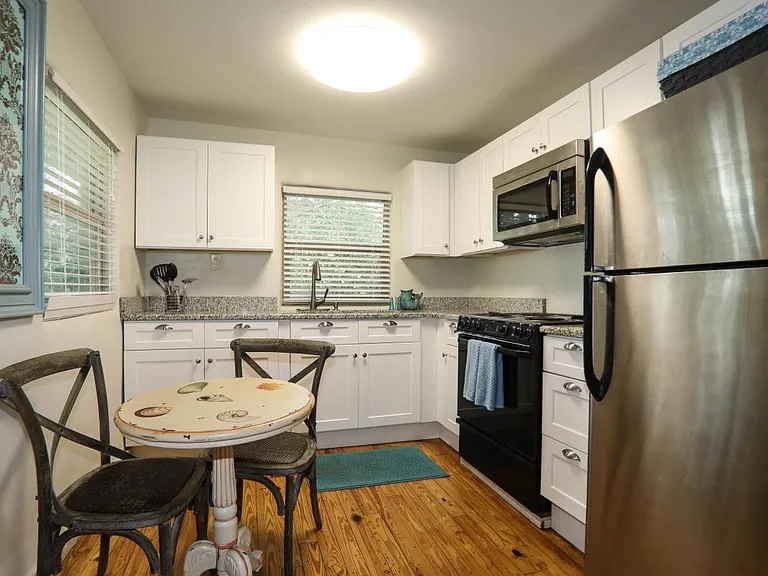 Kitchen with stainless appliances and granite countertops