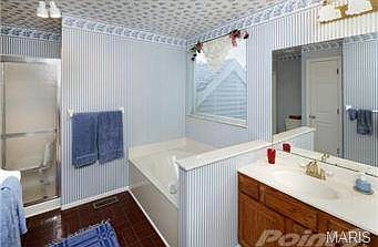 master bath adjoins bedroom, separate shower and soaking tub!