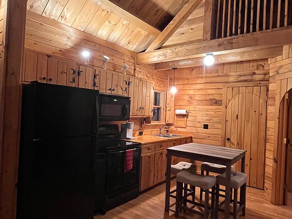 Kitchen is in the process of getting new cabinets. Photos to come.