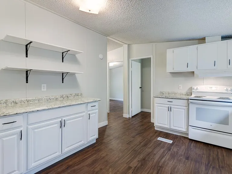 Kitchen leads to bedroom 2 & 3