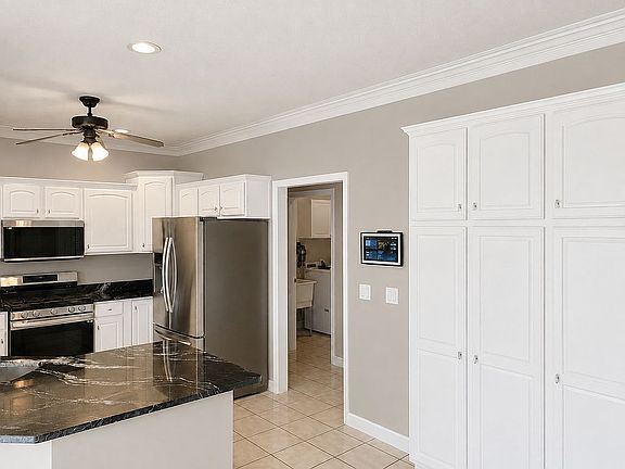 5th image of 409 Whispering Pines Cc Ln