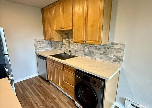 updated kitchen, brand new appliances, quarts countertops and tile backsplash