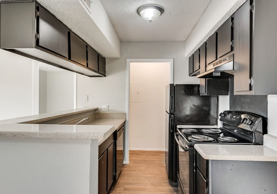 Prepare your favorite meals in a functional kitchen with ample cabinet and counter space.