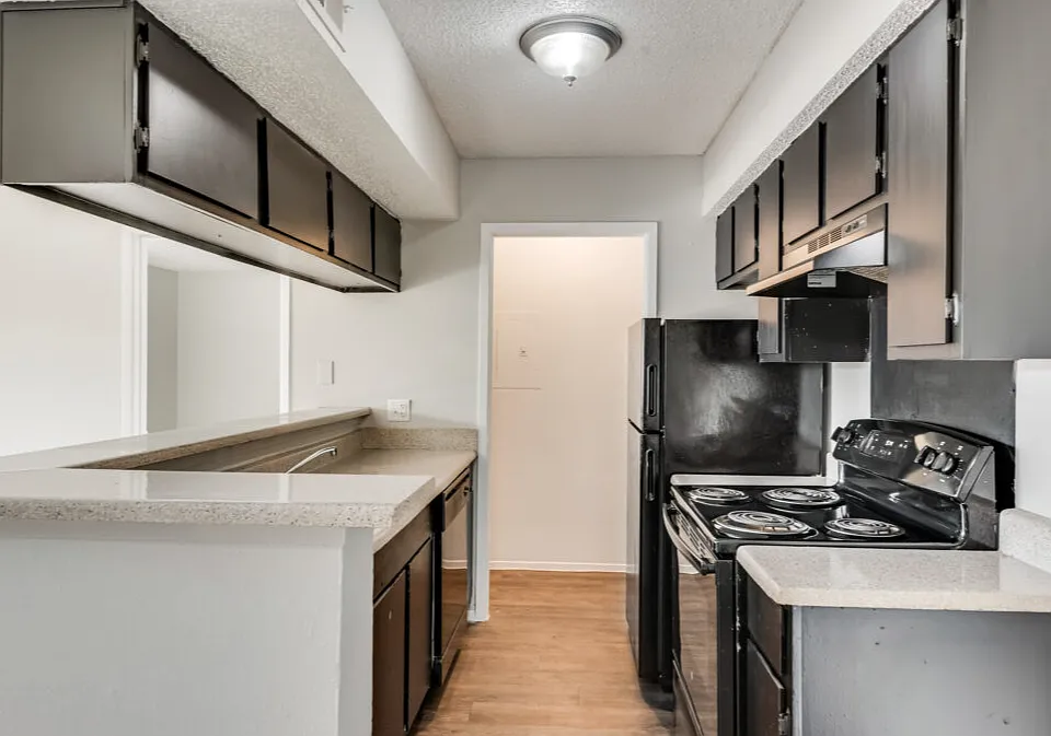 Prepare your favorite meals in a functional kitchen with ample cabinet and counter space.