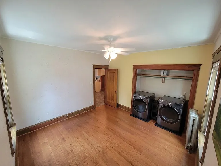 Bedroom with washer/dryer off Kitchen