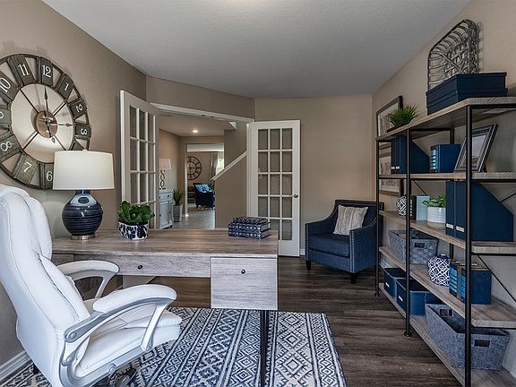 Plan 2411 Den as modeled at Champions Landing