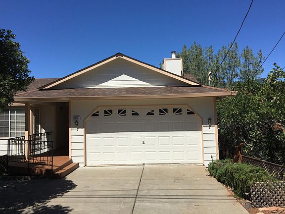 Front of House w/ RV/Boat Parking