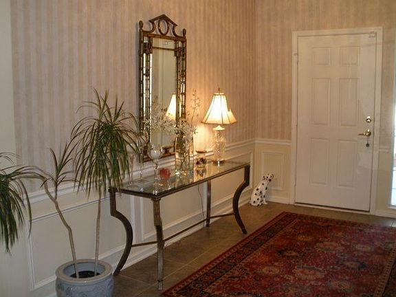 18in.tile in foyer & wainscotting