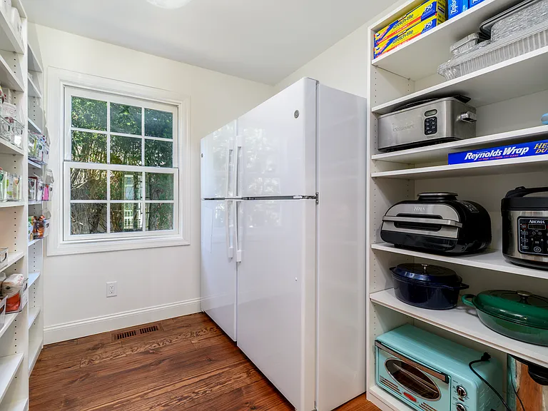 Chef's walk-in, over sized pantry, just off the kitchen with two full refrigerators