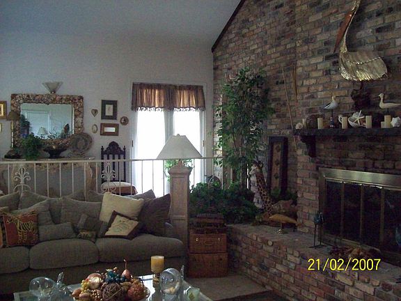 fireplace/and one of two french doors