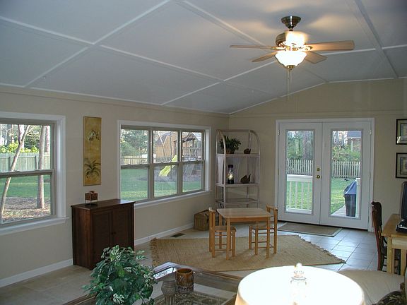 Sunporch Overlooks Beautiful 1/2 Acre Fenced Lot