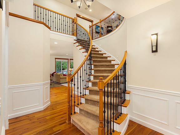 Expansive curved staircase.