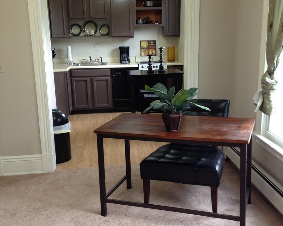 Living room looking into Kitchen 1