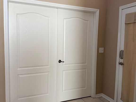 French doors to office or movie room