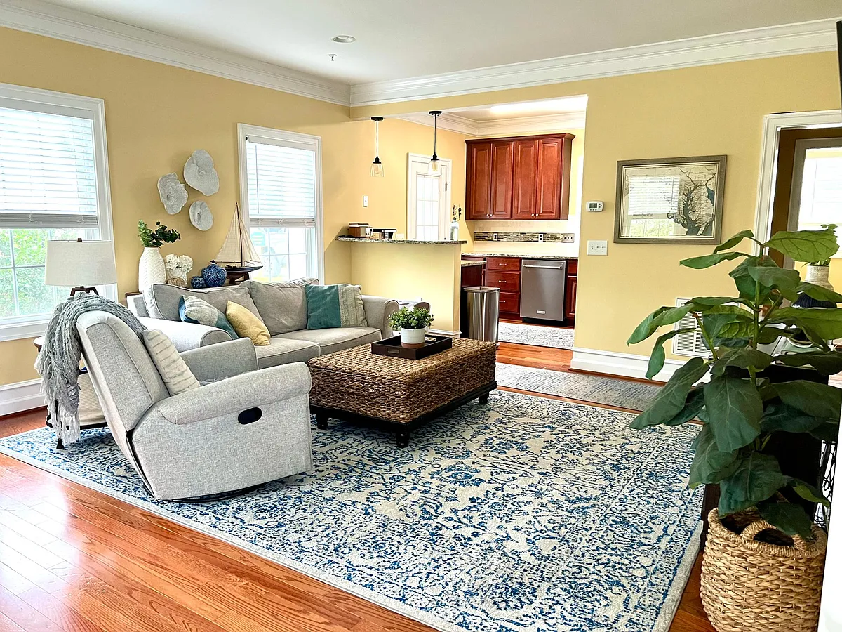 Living area with kitchen view - 104 Charity Ln