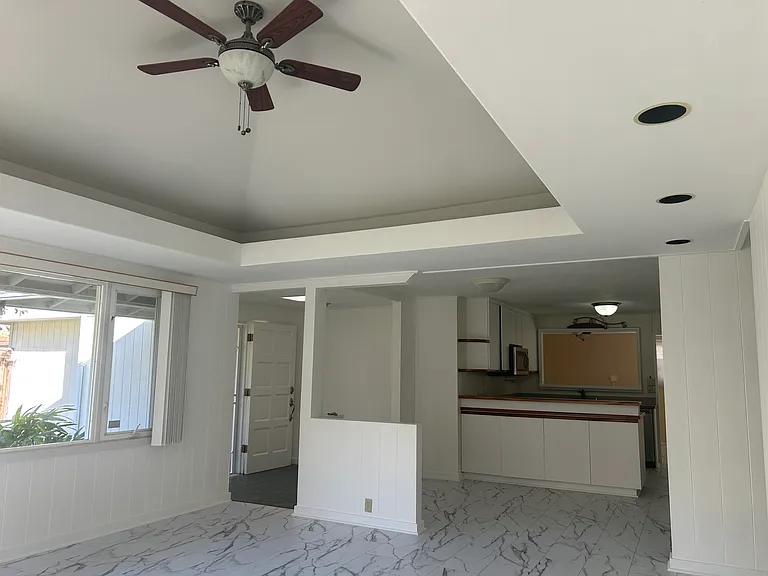 Enter Front Entry, go left to kitchen or go right to living room