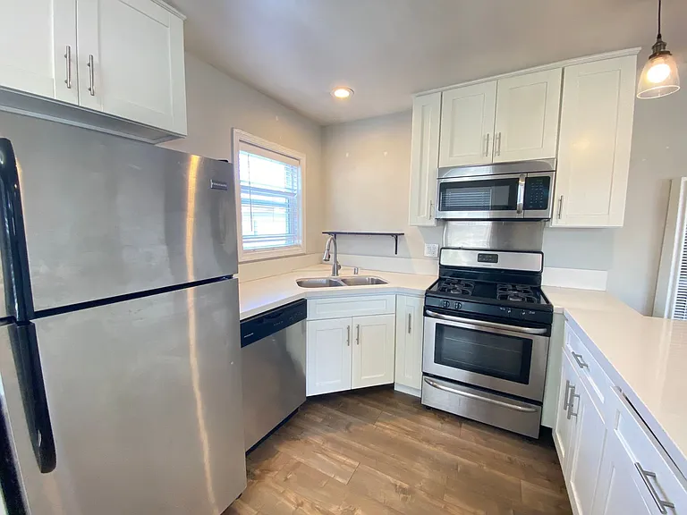 Upstairs Corner Apartment Home! Great North Park Location! Assigned Off Street Parking — Photo 9