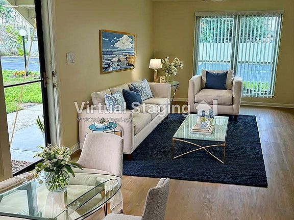 This is an AI staging photo to show what this space could look like. This condo comes unfurnished.