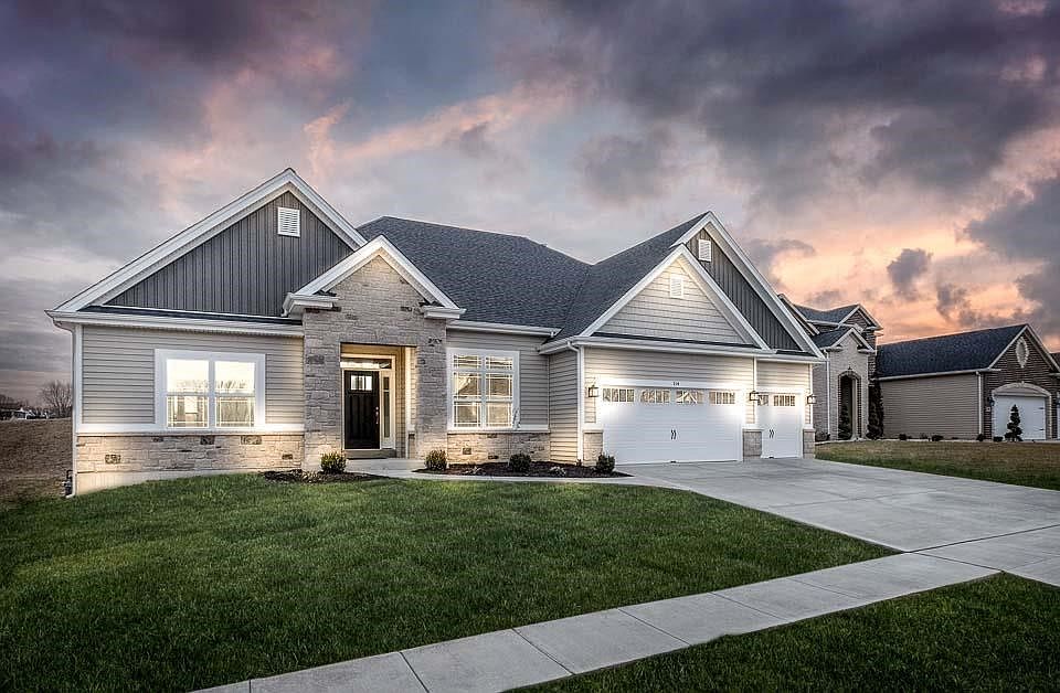 This picture is of a previously built Kingston Model, Stonemoor requires more brick and stone than shown in this elevation
