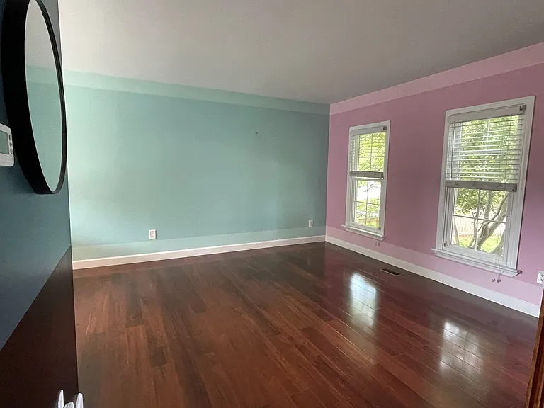 Huge living room opening into the dining room and kitchen.